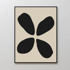 Noir Botanica Canvas Art: Minimalist wall print with four irregular black petal-like shapes arranged in a circle on a beige background, framed in black—ideal for modern decor.