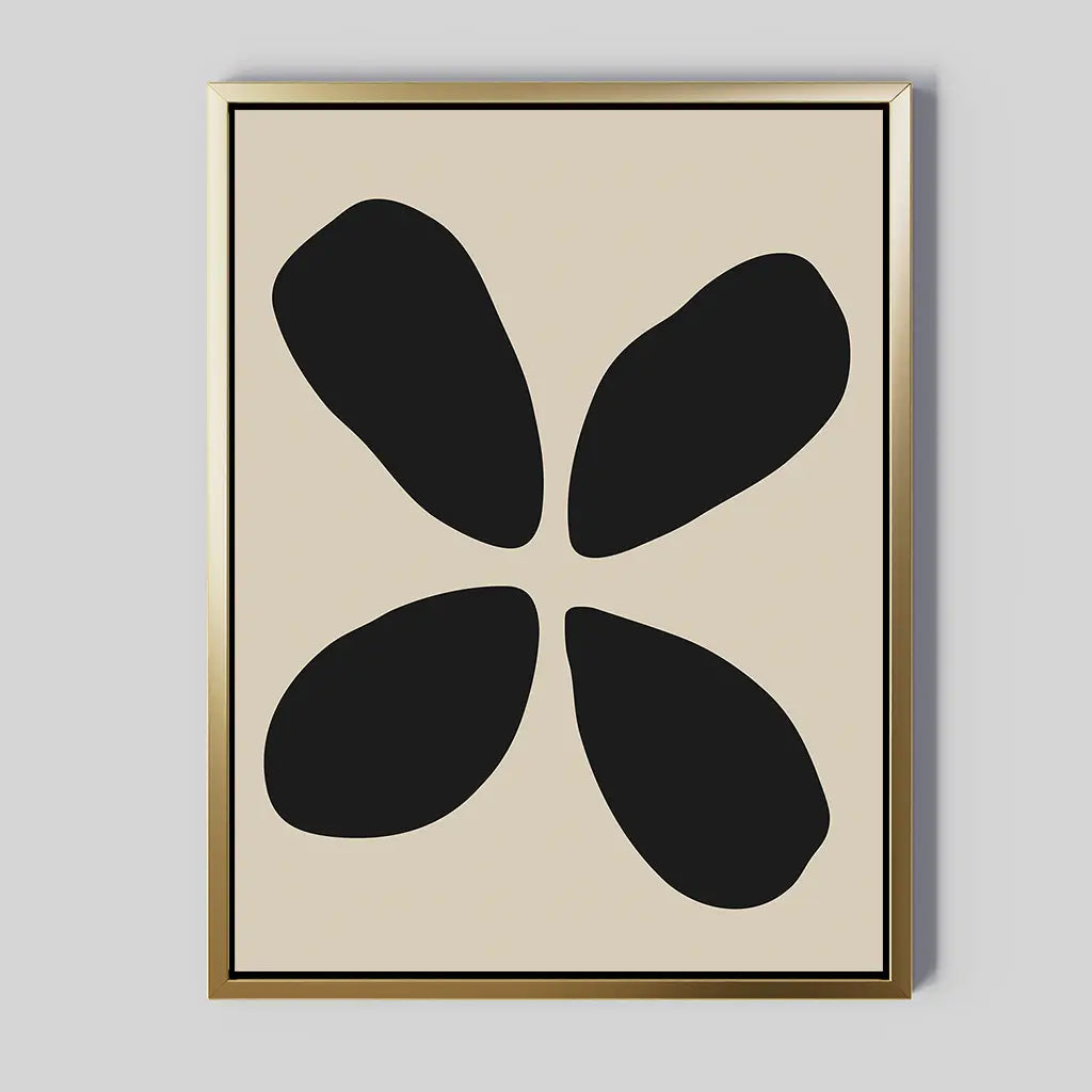 Noir Botanica Canvas Art showcases four irregular black shapes in a symmetrical pinwheel design on a beige background, accented by a slim gold frame—an ideal piece for modern interiors.