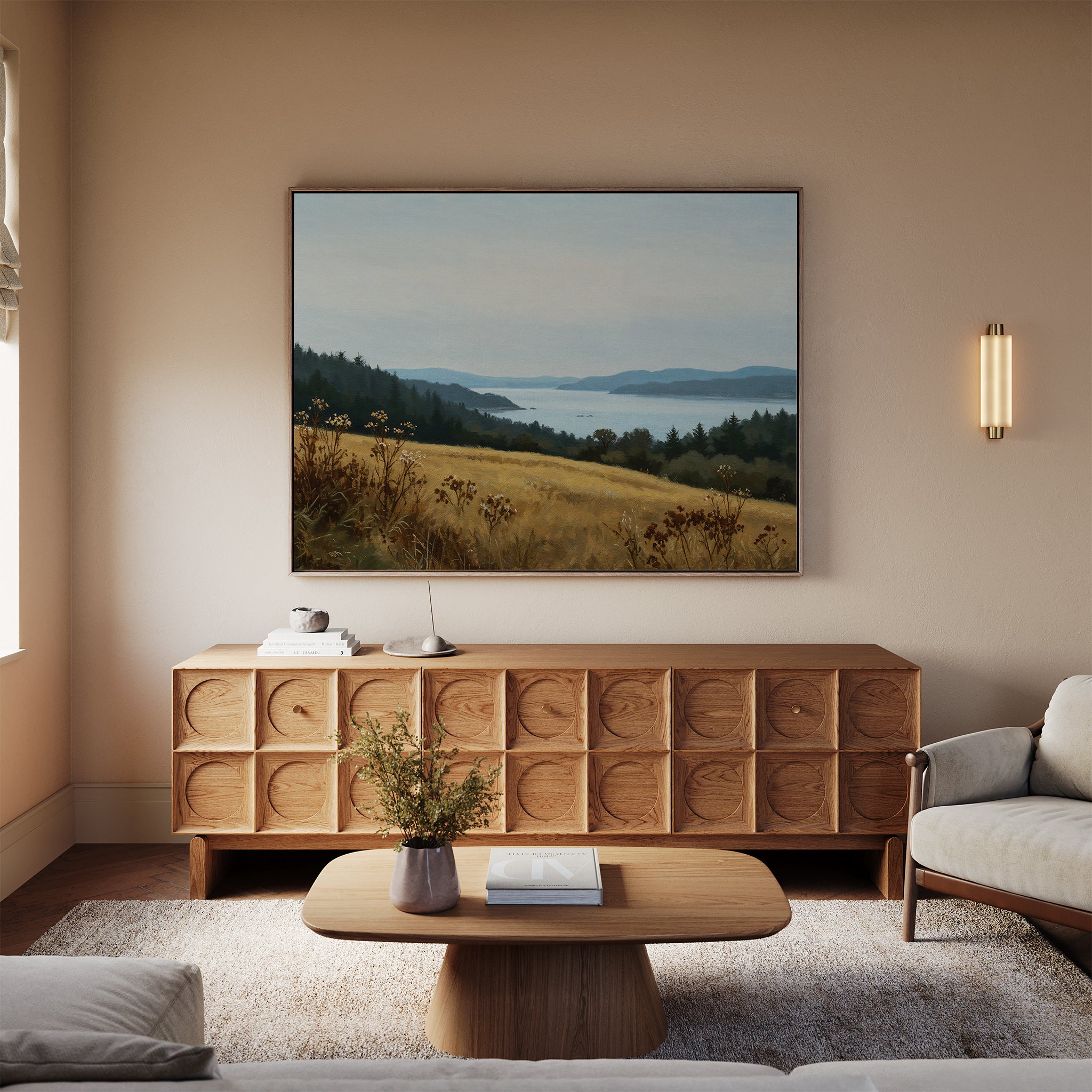 A modern living room with a light sofa, wooden coffee table, and retro-style sideboard. The Northern Silence Canvas Art hangs above the sideboard, while a vase of flowers adds charm to the decor.