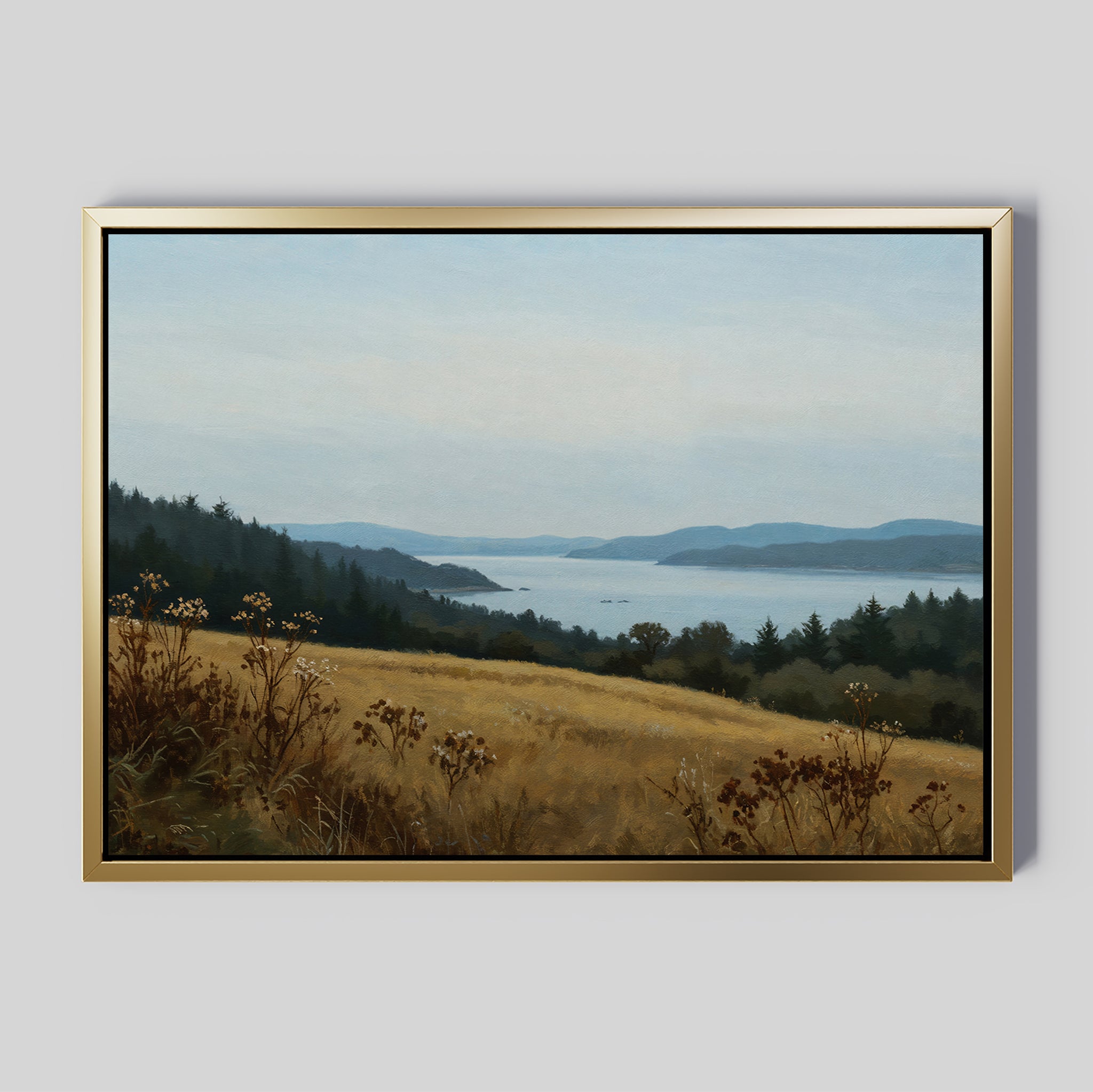 The Northern Silence Canvas Art features a serene landscape with grassy fields, rolling hills, calm water, and distant blue mountains—ideal minimalist wall art to enhance your living room decor.
