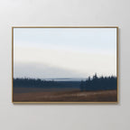 The Northern Woods Canvas Art features a minimalist landscape with a pale sky, distant hills, and silhouetted treeline over muted green and brown fields—ideal wall decor for any space.