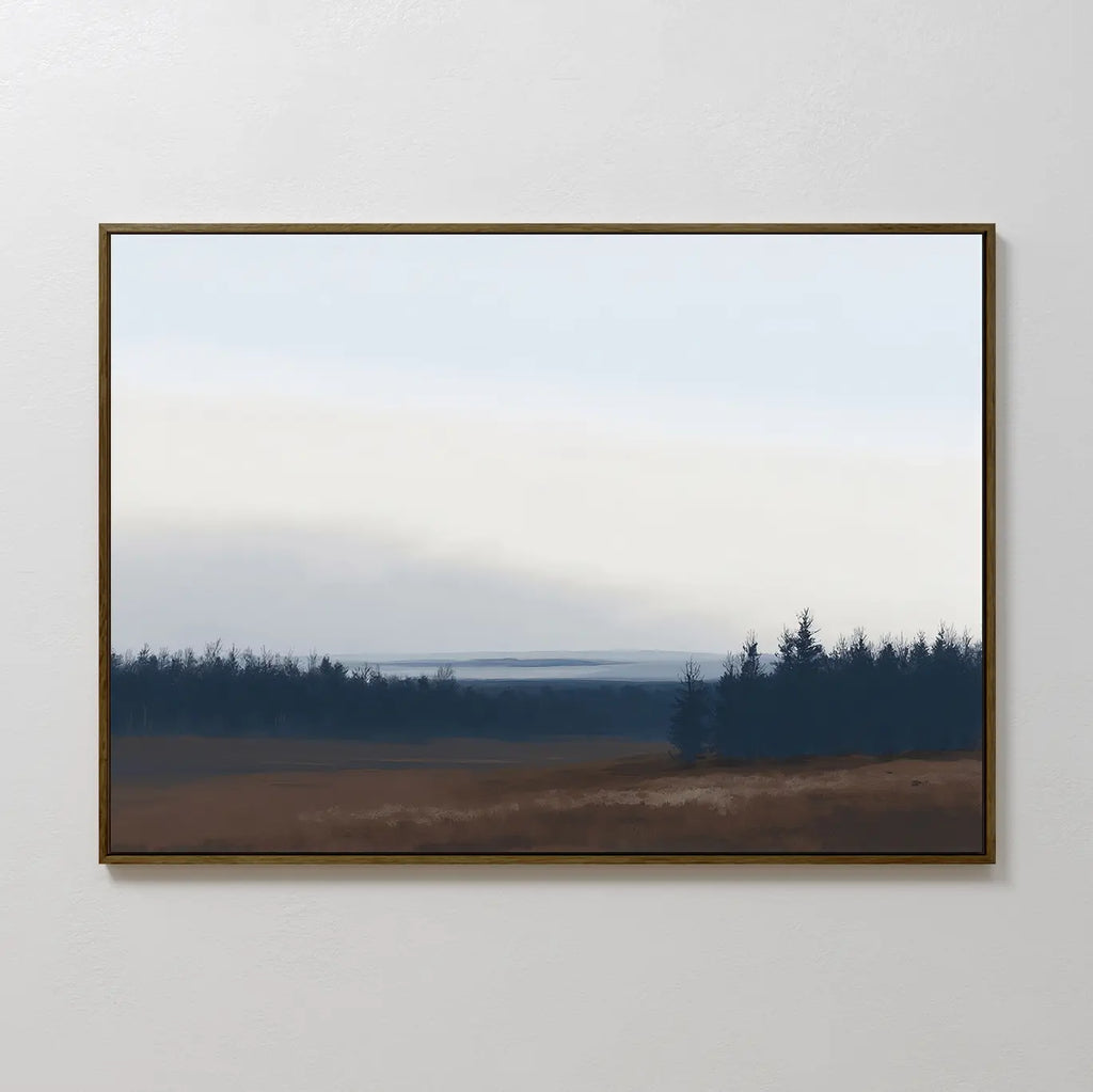 The Northern Woods Canvas Art features a framed minimalist painting of a flat brown field and distant dark trees beneath a pale, cloudy sky, evoking the tranquil beauty of a Nordic park.