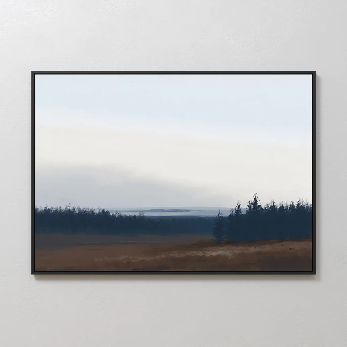 Northern Woods Canvas Art, a framed minimalist piece depicting a tranquil field with brown grass, distant dark trees, and a soft blue-gray sky, brings Nordic park serenity to any light-colored wall.