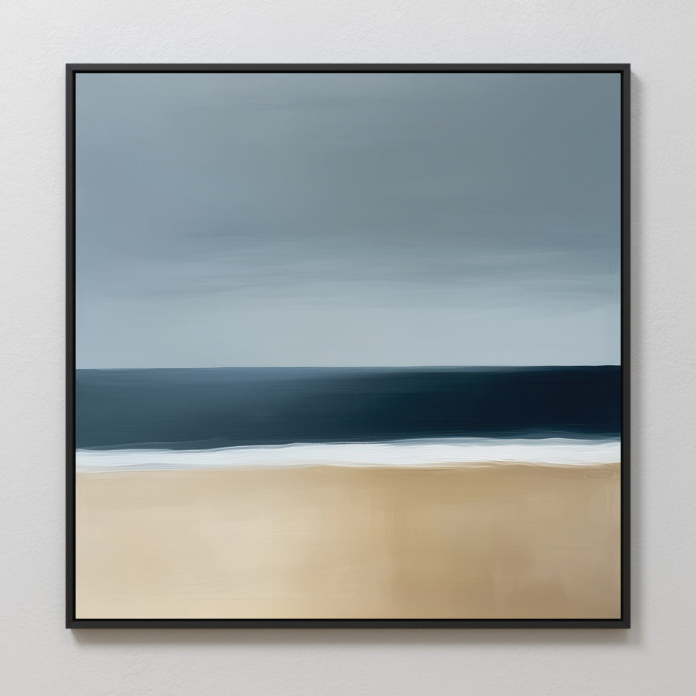Ocean Edge Canvas Art is a framed minimalist seascape with a beige beach, dark blue ocean, and gray-blue sky. Smooth brushstrokes create soft transitions—perfect as modern coastal wall art.
