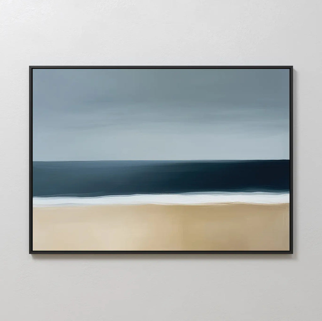 The Ocean Edge Canvas Art – Horizontal showcases minimalist abstract coastal style with beige sand, dark blue waves, and a cloudy gray sky in a thin black frame—ideal as large wall décor for modern interiors.