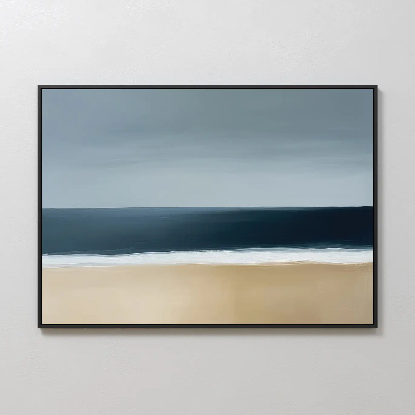 The Ocean Edge Canvas Art – Horizontal showcases minimalist abstract coastal style with beige sand, dark blue waves, and a cloudy gray sky in a thin black frame—ideal as large wall décor for modern interiors.
