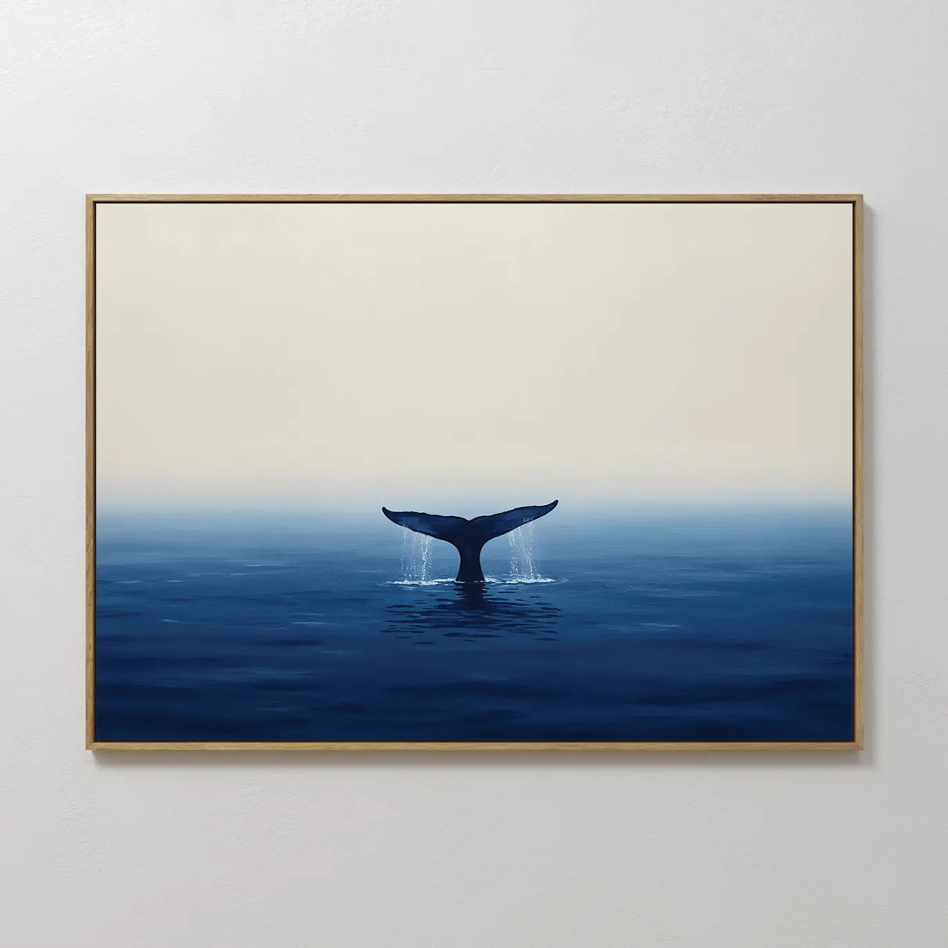 Ocean Giant Canvas Art features a whale’s tail rising from calm blue water beneath a minimalist sky, embodying tranquility and simplicity—ideal coastal wall art to bring serene, peaceful vibes to any space.