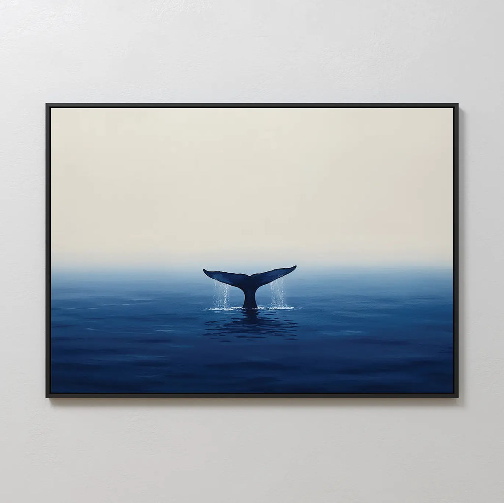 The Ocean Giant Canvas Art showcases a whale’s tail fin rising from tranquil blue waters beneath a soft gradient sky, offering a serene and minimalist seascape print ideal for coastal decor enthusiasts.