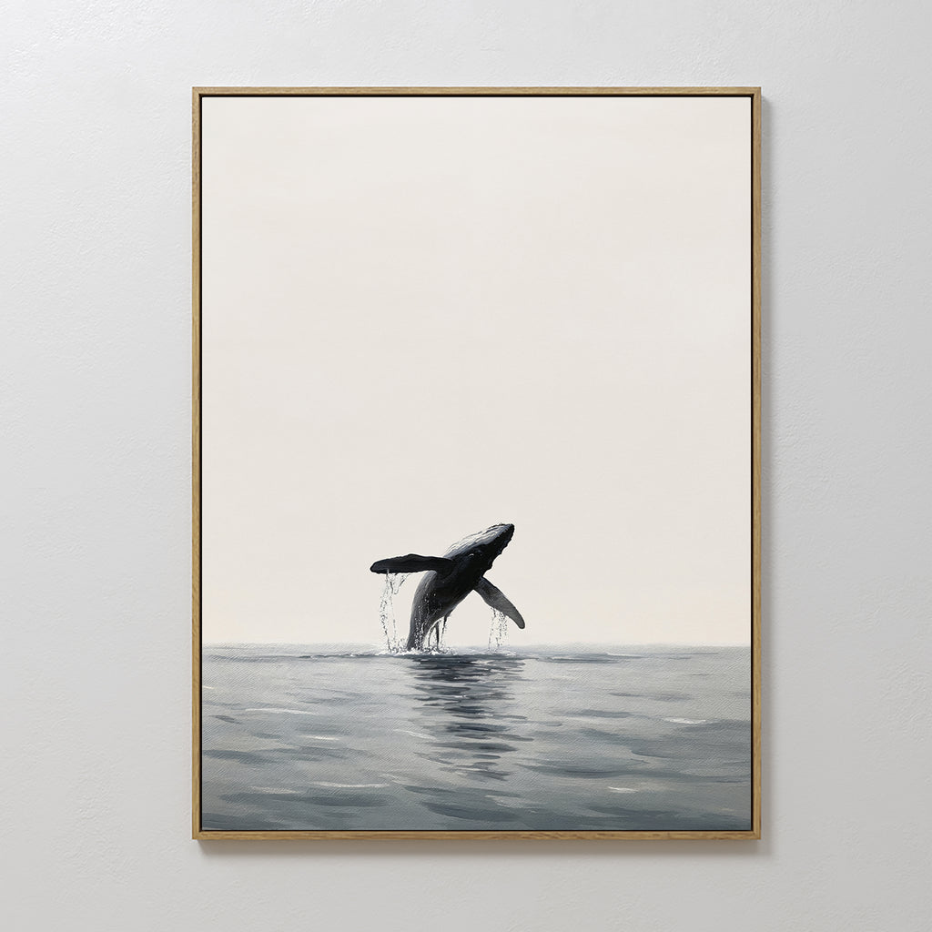 The Ocean Leap Canvas Art showcases a whale breaching the tranquil ocean in a minimal, neutral palette, ideal for minimalist wall art lovers and displayed beautifully on a white wall.
