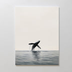 Ocean Leap Canvas Art features a minimalist whale breaching over calm water with gentle reflections on a neutral background—ideal as large wall art for creating a serene, modern atmosphere.