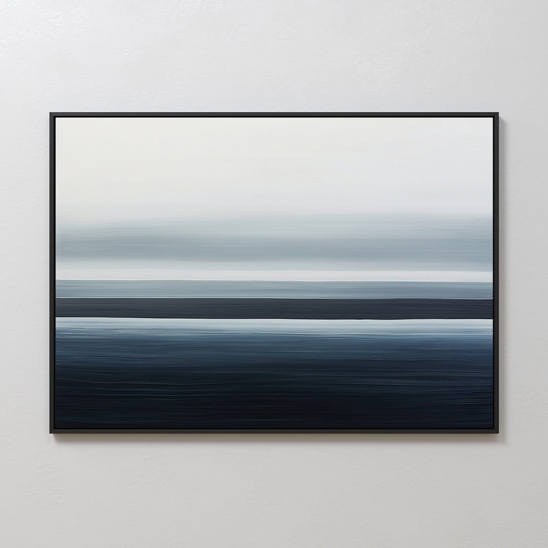 The Oceanic Blur Canvas Art – Horizontal showcases blurred bands of blue, gray, and white on canvas, adding a serene coastal vibe and modern minimalist style to any light-colored wall.