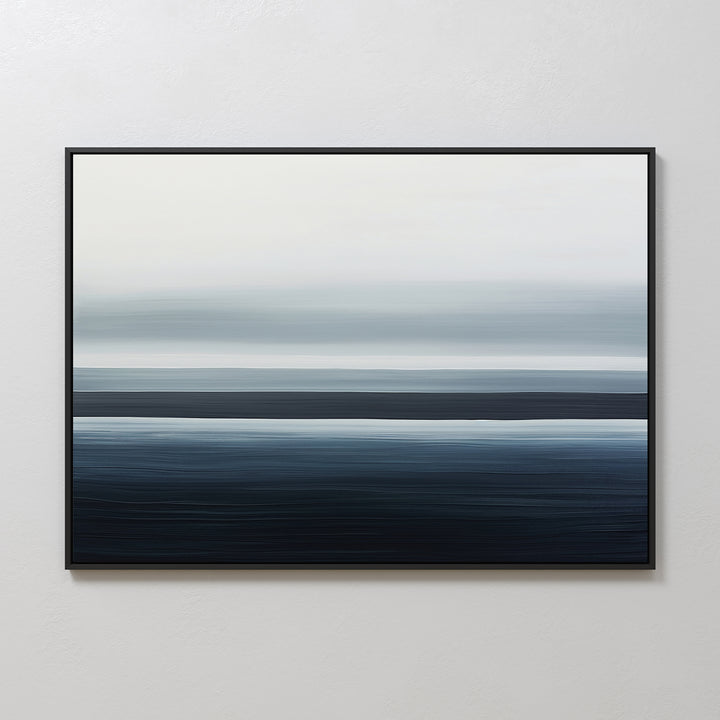 The Oceanic Blur Canvas Art – Horizontal showcases blurred bands of blue, gray, and white on canvas, adding a serene coastal vibe and modern minimalist style to any light-colored wall.