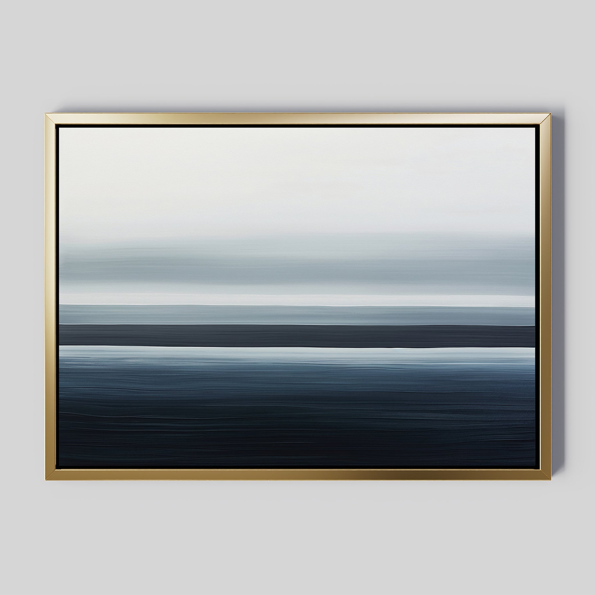 The Oceanic Blur Canvas Art – Horizontal features abstract bands of blue, gray, and white, creating a serene, minimalist seascape look that brings calming coastal vibes to any light gray wall.