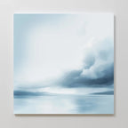 Oceanic Overcast Canvas Art: a minimalist abstract seascape print with soft blue and white tones, depicting water, distant land, and dreamy clouds—ideal wall art for adding peaceful, calming vibes to any space.