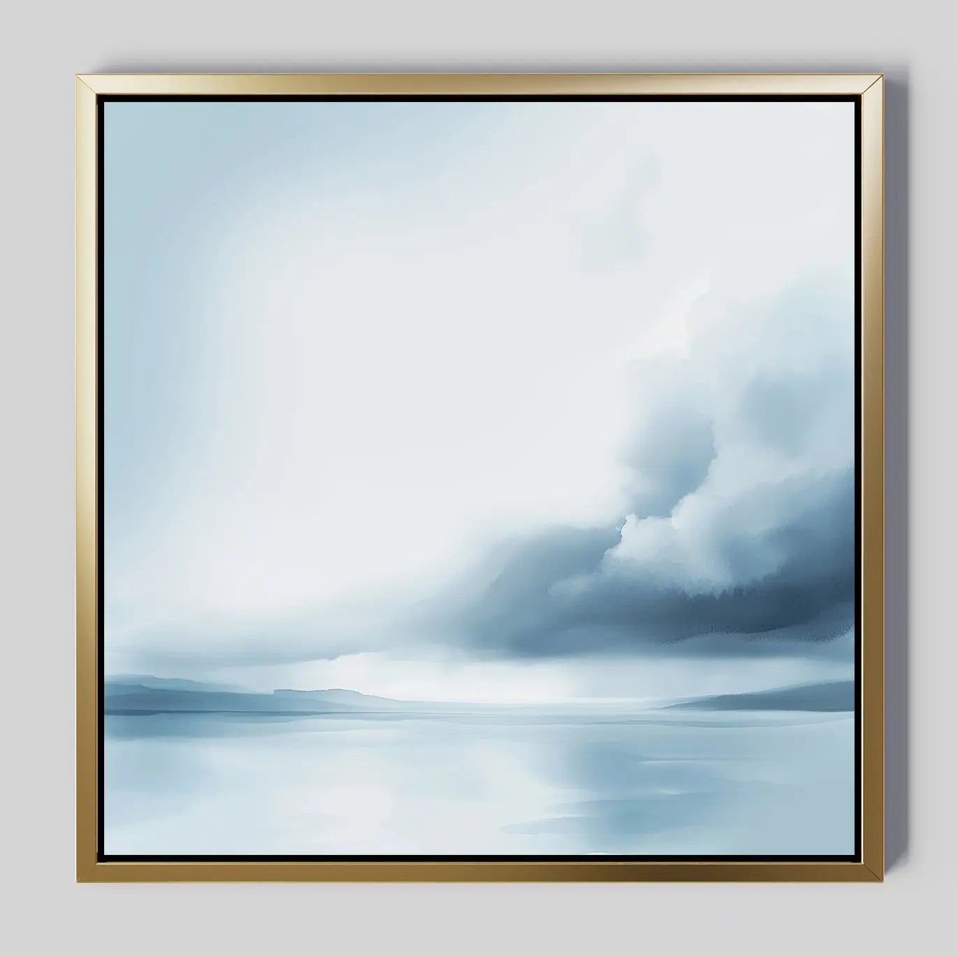 Oceanic Overcast Canvas Art features a minimalist seascape in cool blue and white, showing tranquil waters beneath a cloudy sky. The sleek gold frame adds elegance, making it perfect for creating a calming atmosphere.