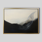 Oceanic Pulse Abstract Canvas Art, in a gold frame, displays flowing white and gray shapes over a dark background—evoking wind or waves. Perfect minimalist wall art for living room decor set against a light gray wall.