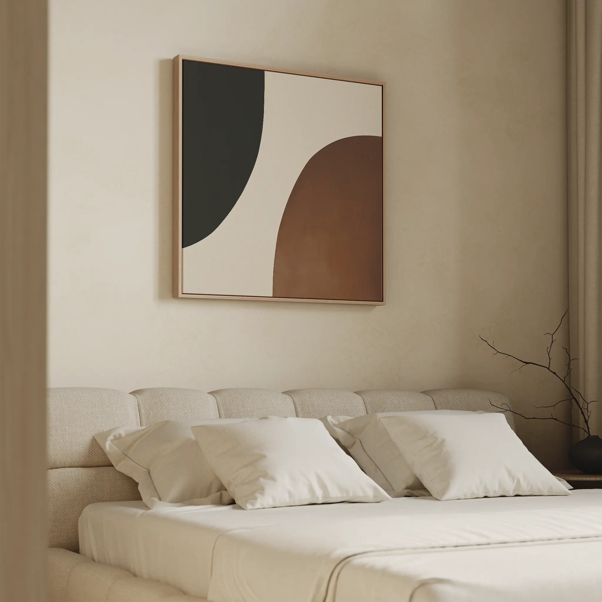 A modern bedroom with a beige upholstered bed, white bedding, and four pillows. Above the bed hangs the Organic Balance Canvas Art in black, white, and brown tones. A vase with bare twigs sits on the right side.
