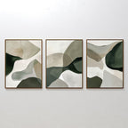 The Organic Flow Set of 3 features abstract paintings with overlapping organic shapes in soothing green, beige, and white tones, each framed in slim brown frames—perfect for adding modern elegance to your wall.