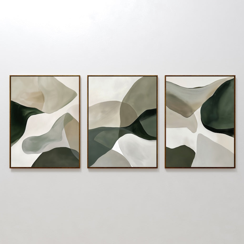 The Organic Flow Set of 3 features abstract paintings with overlapping organic shapes in soothing green, beige, and white tones, each framed in slim brown frames—perfect for adding modern elegance to your wall.