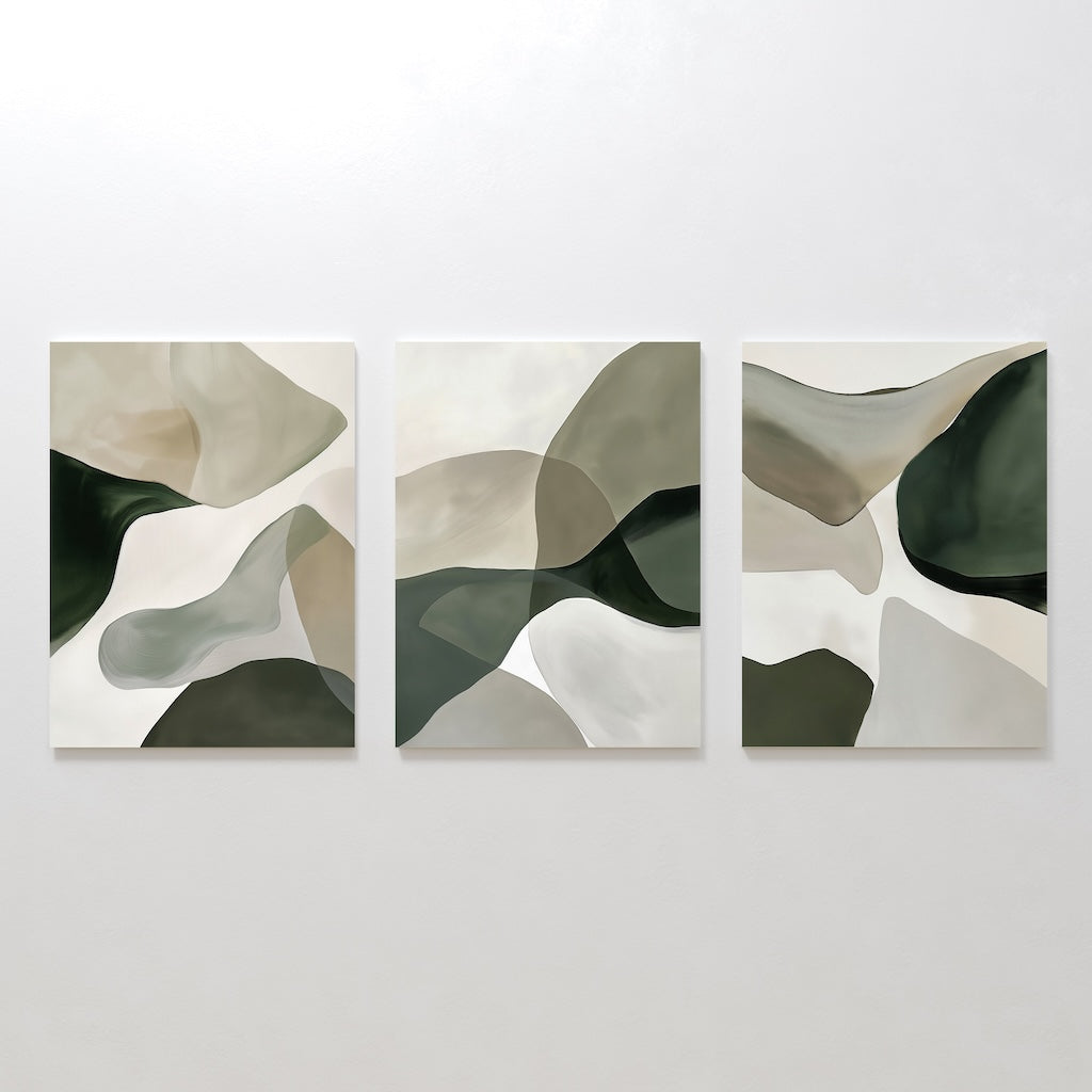 The Organic Flow Set of 3 features abstract paintings with overlapping organic shapes in muted green, beige, and white tones, displayed side by side for a modern look.