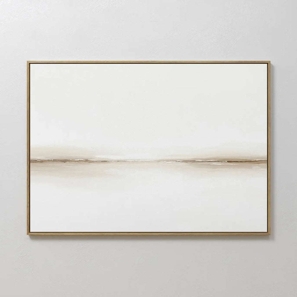 Pale Desert Canvas Art features a soft, horizontal beige and brown line on a white background in a slim gold frame—perfect for elevating your living room decor against a light gray wall.