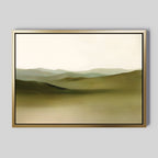Pastoral Peace Canvas Art features soft, rolling hills in muted green and beige with a pale sky—ideal minimalist wall decor for serene art lovers. Displayed on a plain grey wall, it complements any tranquil space.