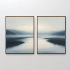 The Peaceful Waters Set of 2 features framed paintings of a misty lake in soft, muted hues—ideal calming landscape wall art to bring a serene, tranquil mood to any space.