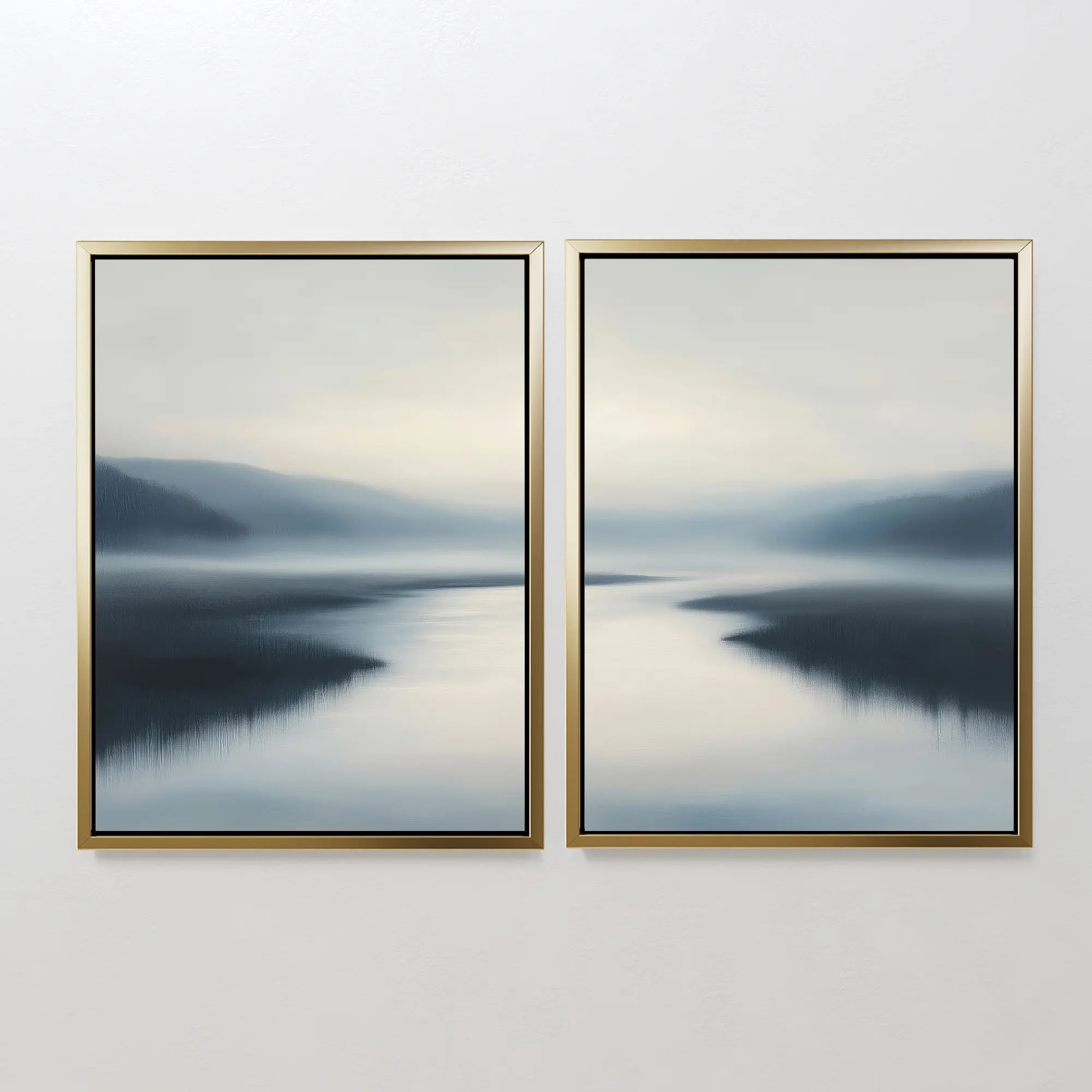 The Peaceful Waters Set of 2 features framed calming landscape wall art with a misty, serene lake and gentle hills in soft blue and gray tones, displayed side by side on a white wall.