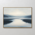 The Peaceful Waters Canvas Art – Horizontal features calm water reflecting soft light with blurred hills and a hazy blue, gray, and white sky—ideal calming landscape wall art for a tranquil living room.