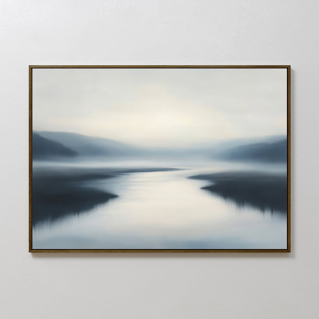 The "Peaceful Waters Canvas Art – Horizontal," featuring a serene misty landscape in cool blue and gray tones, adds tranquil beauty to your living room as calming landscape wall art on any blank white wall.