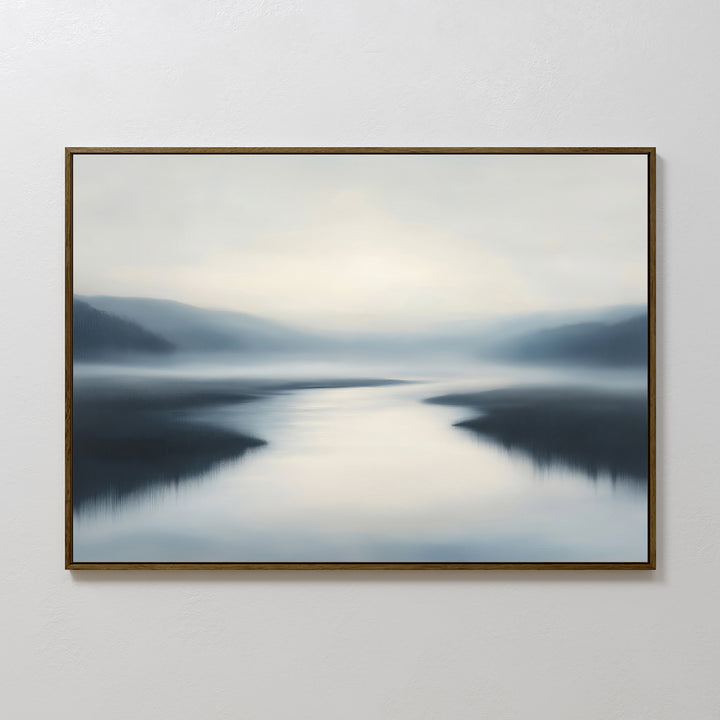 The "Peaceful Waters Canvas Art – Horizontal," featuring a serene misty landscape in cool blue and gray tones, adds tranquil beauty to your living room as calming landscape wall art on any blank white wall.