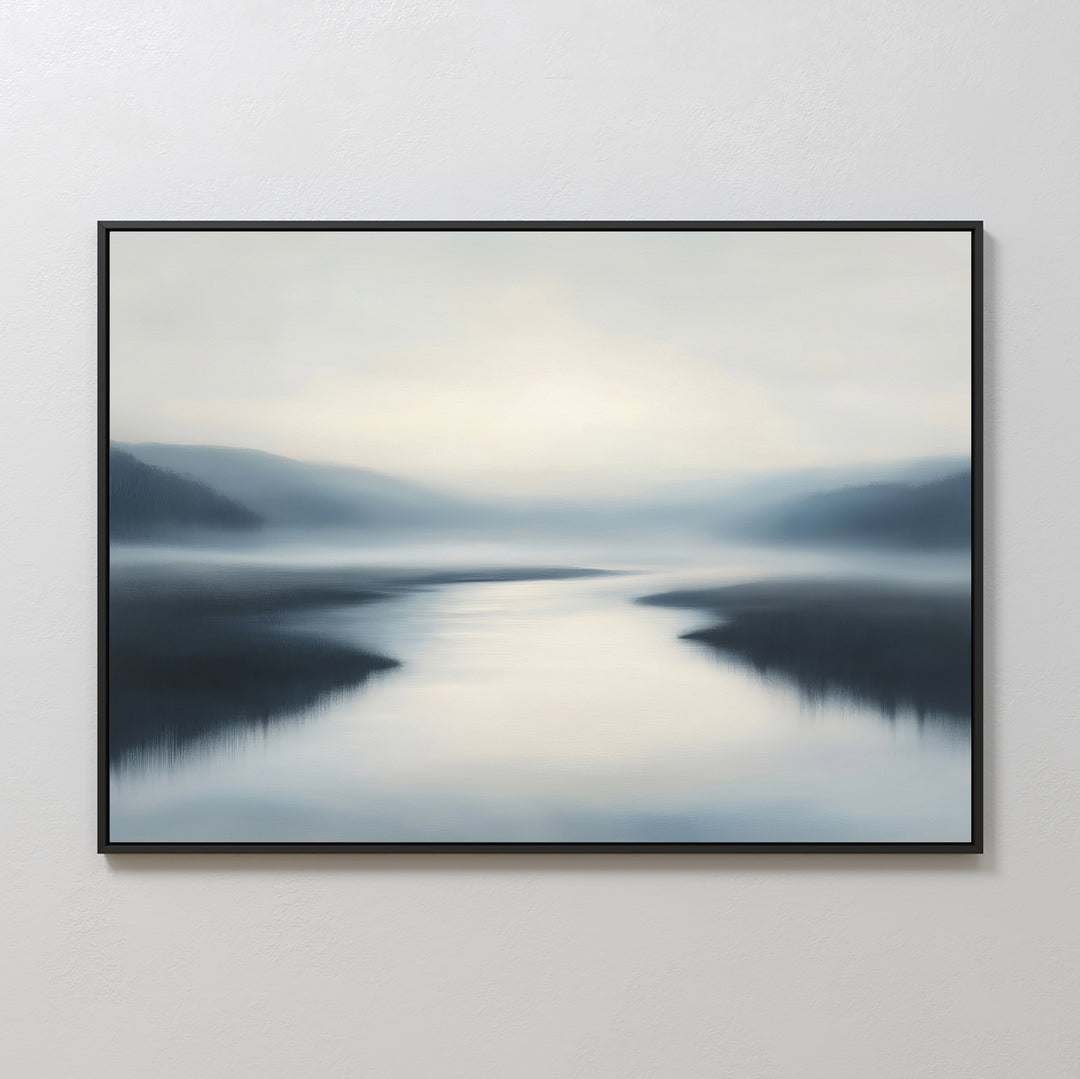 The Peaceful Waters Canvas Art – Horizontal features a serene, misty landscape with calm water reflecting a pale sky, framed by dark hills and distant blue-gray mountains—ideal as calming wall art or tranquil living room decor.
