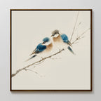 The Perched Companions Canvas Art showcases two blue and brown birds on a bare branch, set against a neutral backdrop and finished with a simple dark frame—an ideal choice for Nordic-inspired wall decor.