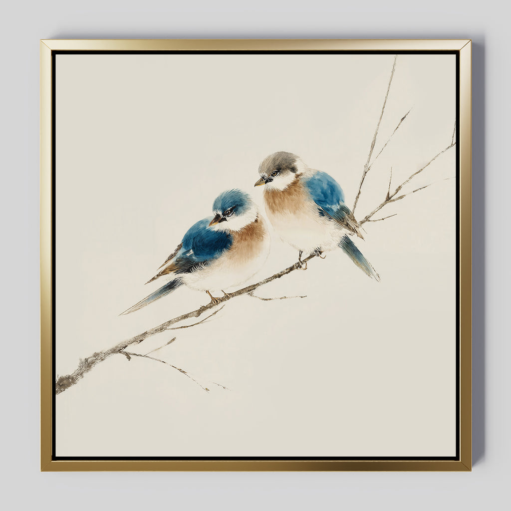 The Perched Companions Canvas Art features two blue and brown birds on a bare branch against a light background. This minimalistic, framed artwork with a gold finish is perfect for Nordic wall decor.