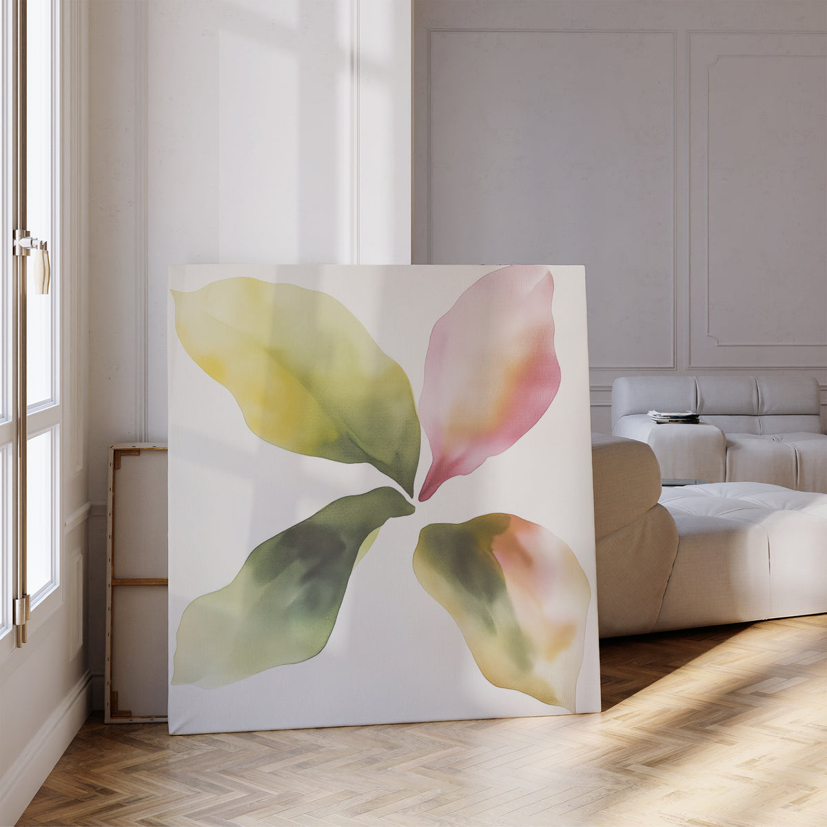 The Petal Hues Canvas Art, featuring an abstract floral design with four colorful leaf-like shapes in green, yellow, and pink, adds a vibrant touch to a bright, modern living room with wood flooring and neutral furniture.