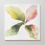 Petal Hues Canvas Art features an abstract watercolor of four large overlapping leaves in green, yellow, and pink, forming a circular floral design—ideal as modern home decor or a statement wall art print on a white background.