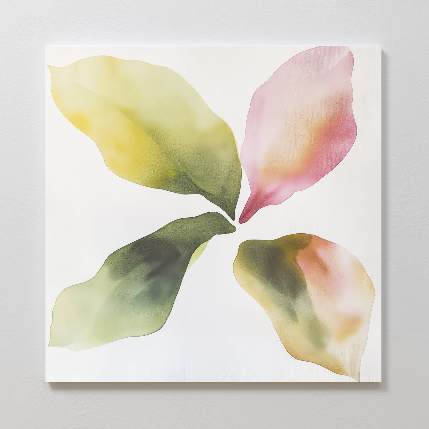 Petal Hues Canvas Art features an abstract watercolor of four large overlapping leaves in green, yellow, and pink, forming a circular floral design—ideal as modern home decor or a statement wall art print on a white background.