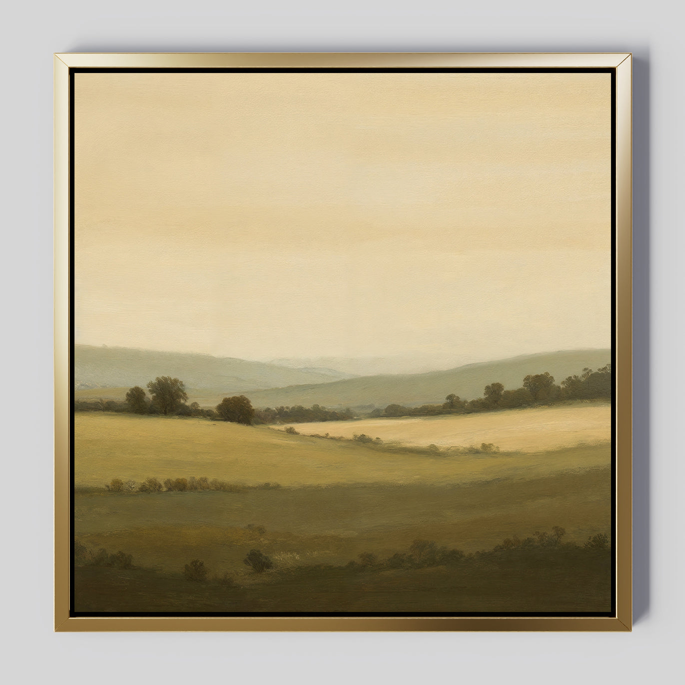 Quiet Countryside Canvas Art features a tranquil rural scene with rolling green hills, scattered trees, and a hazy sky. Its gold frame with black inner border adds minimalist style, making it ideal wall art for serene spaces.
