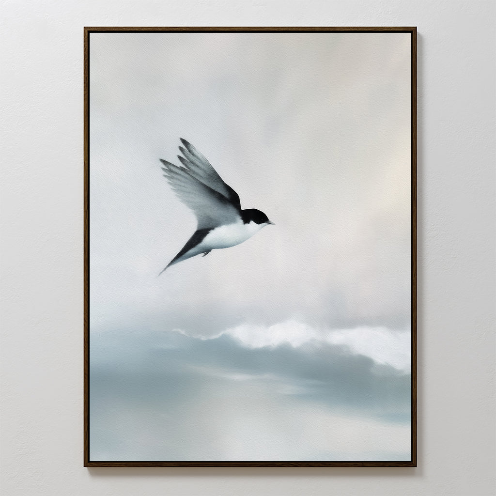 The Quiet Flight Canvas Art features a black and white swallow soaring over soft, cloudy skies with a serene minimal backdrop—ideal for Nordic Park style or minimalist wall decor.