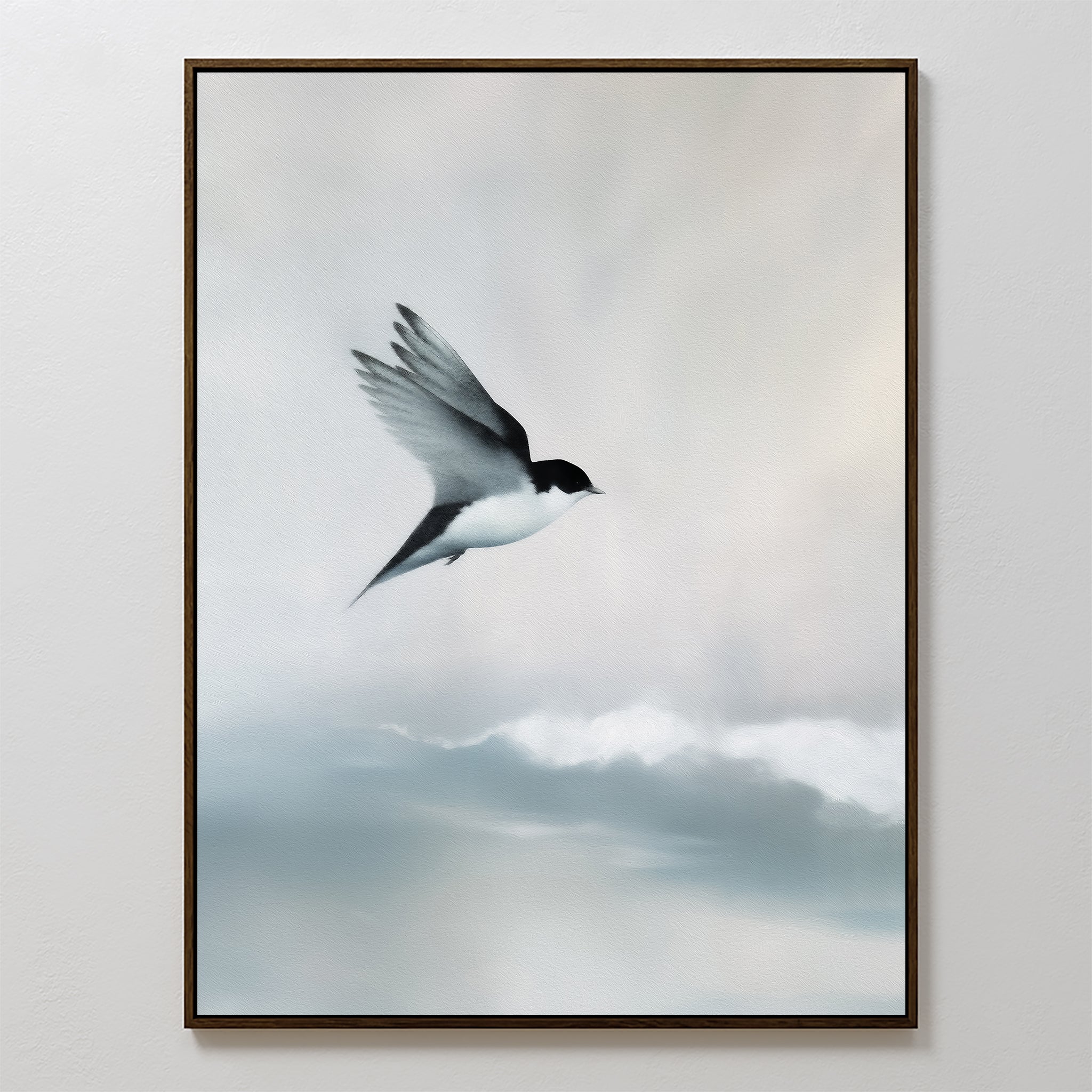 The Quiet Flight Canvas Art features a black and white swallow soaring over soft, cloudy skies with a serene minimal backdrop—ideal for Nordic Park style or minimalist wall decor.