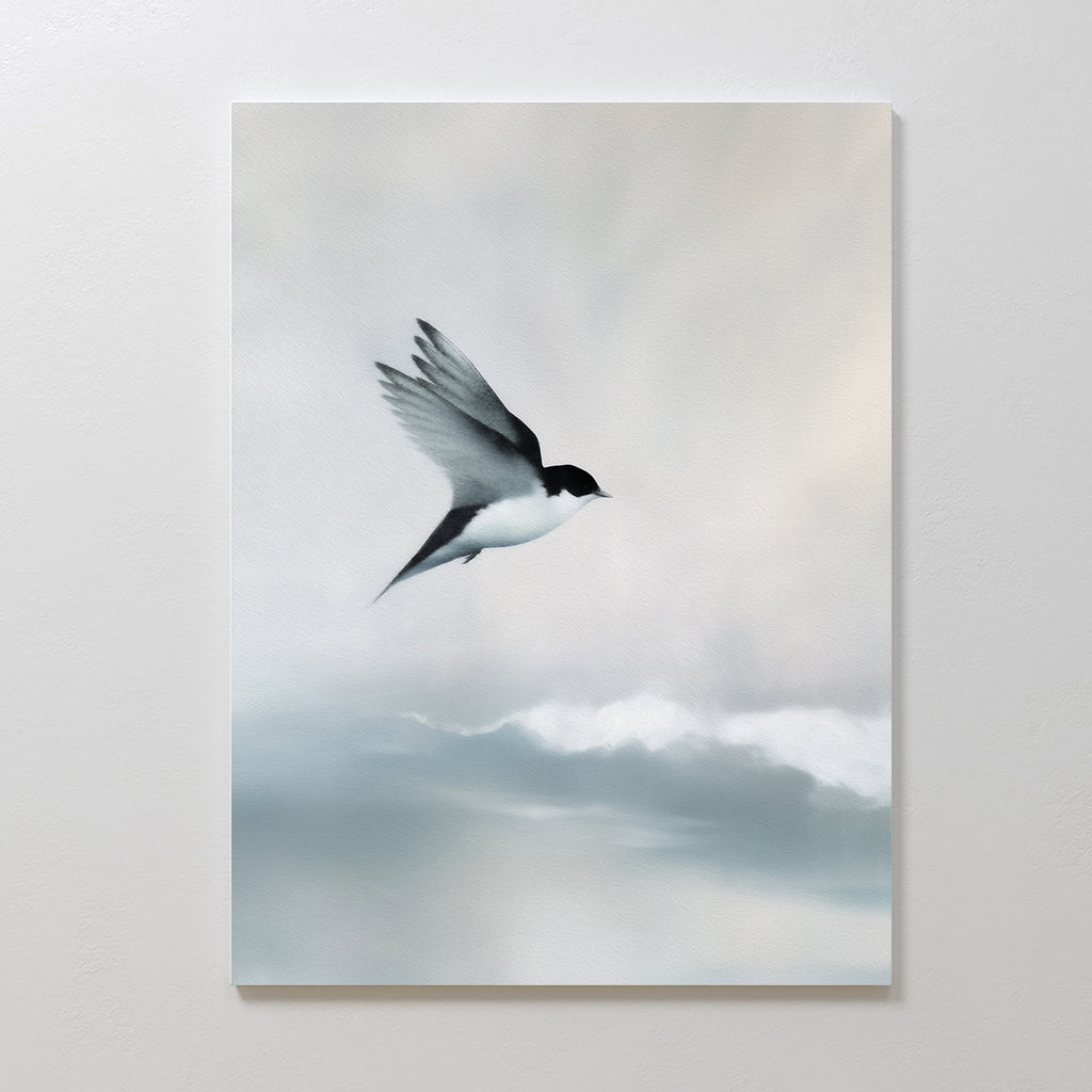 Quiet Flight Canvas Art features a black and white bird soaring above soft, cloudy skies with a muted background—ideal as minimalist wall decor or serene wall art for your Nordic Park-inspired space.