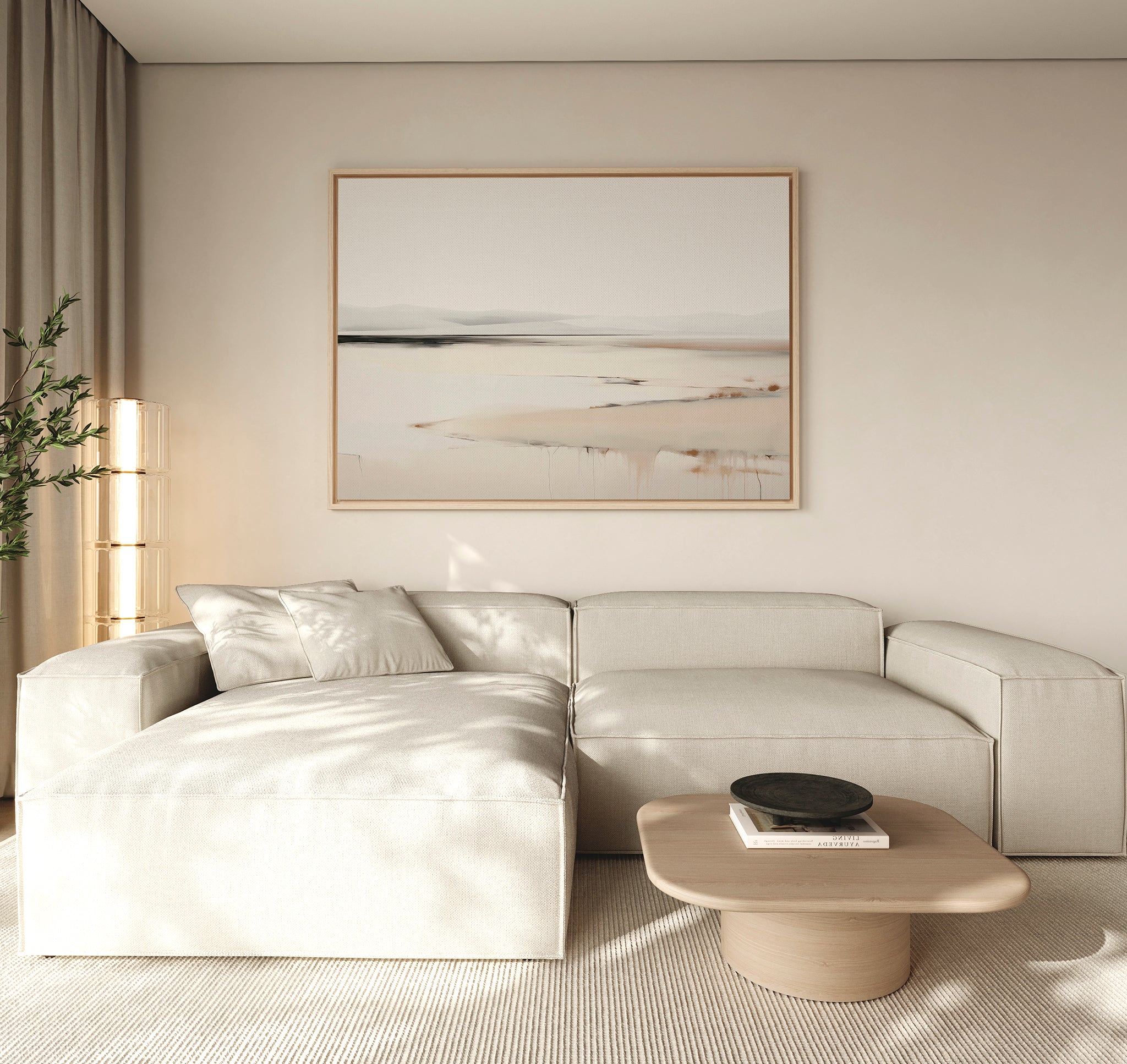 A modern living room features a light beige sectional sofa, wooden coffee table, black bowl, tall plant, and the Quiet Valley Canvas Art – Horizontal. Neutral hues and minimalist elegance create a calm, inviting atmosphere.