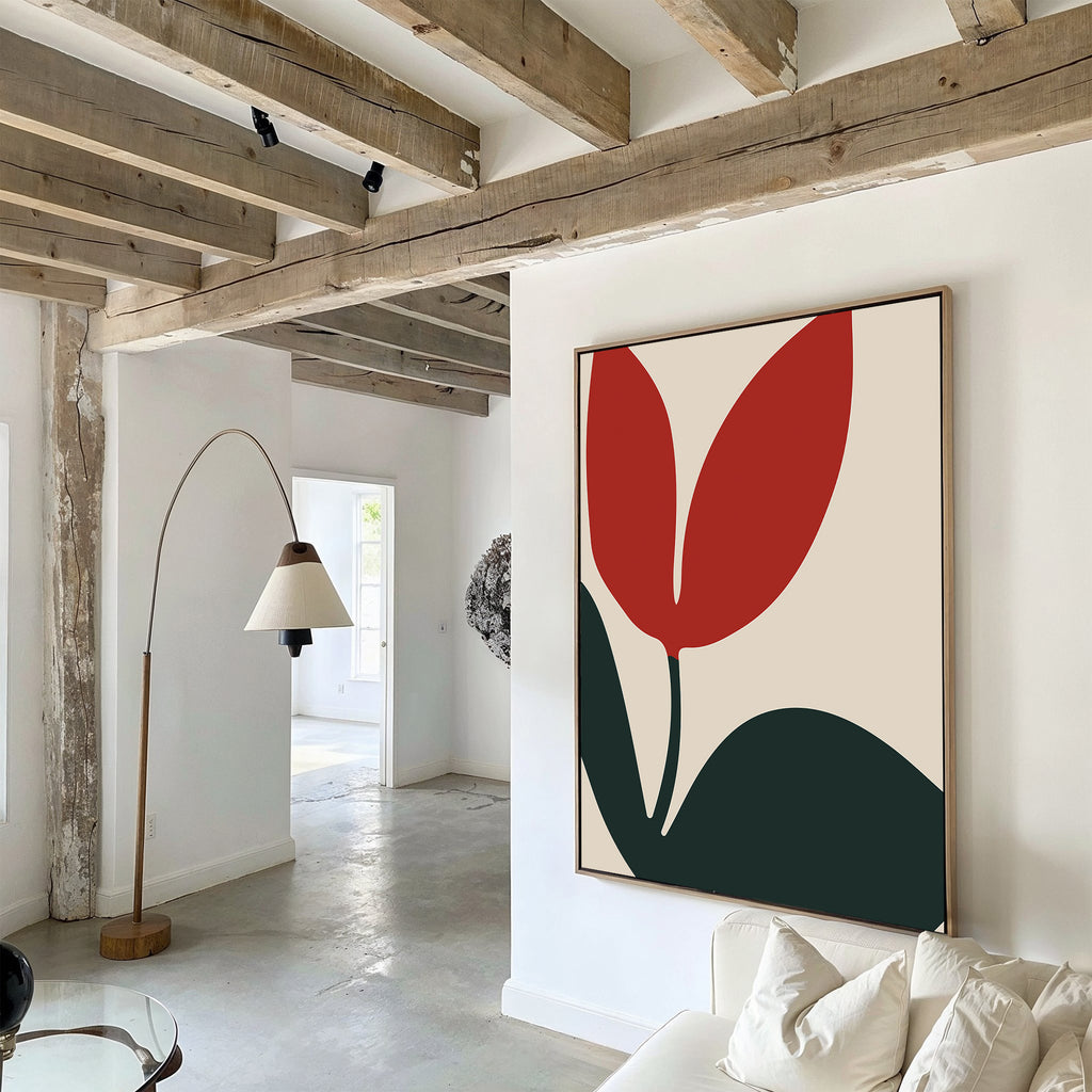 A modern living room with exposed wooden beams, white walls, a floor lamp, and the Red Botanic Abstract Canvas Art above a white couch. Natural light fills the space, accentuating the bold minimalist decor.
