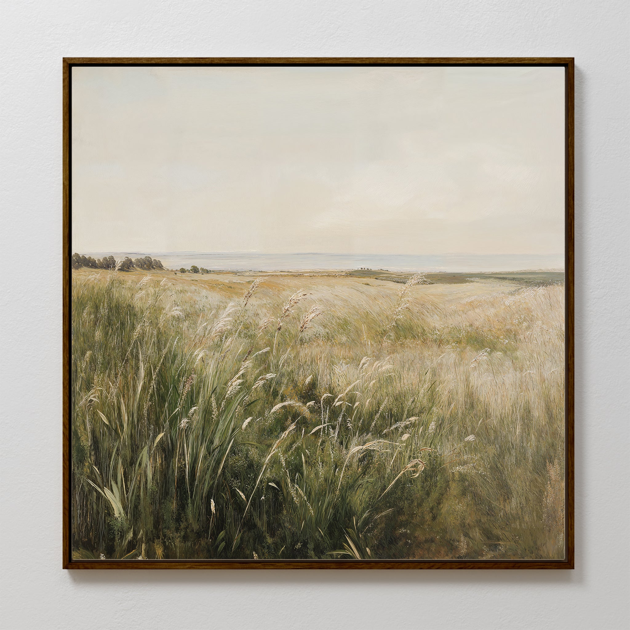Reeds by the River Canvas Art is a framed minimalist painting featuring soft, earthy tones of a grassy sunlit field and cloudy sky. This calming wall art print adds natural beauty to any living room decor.