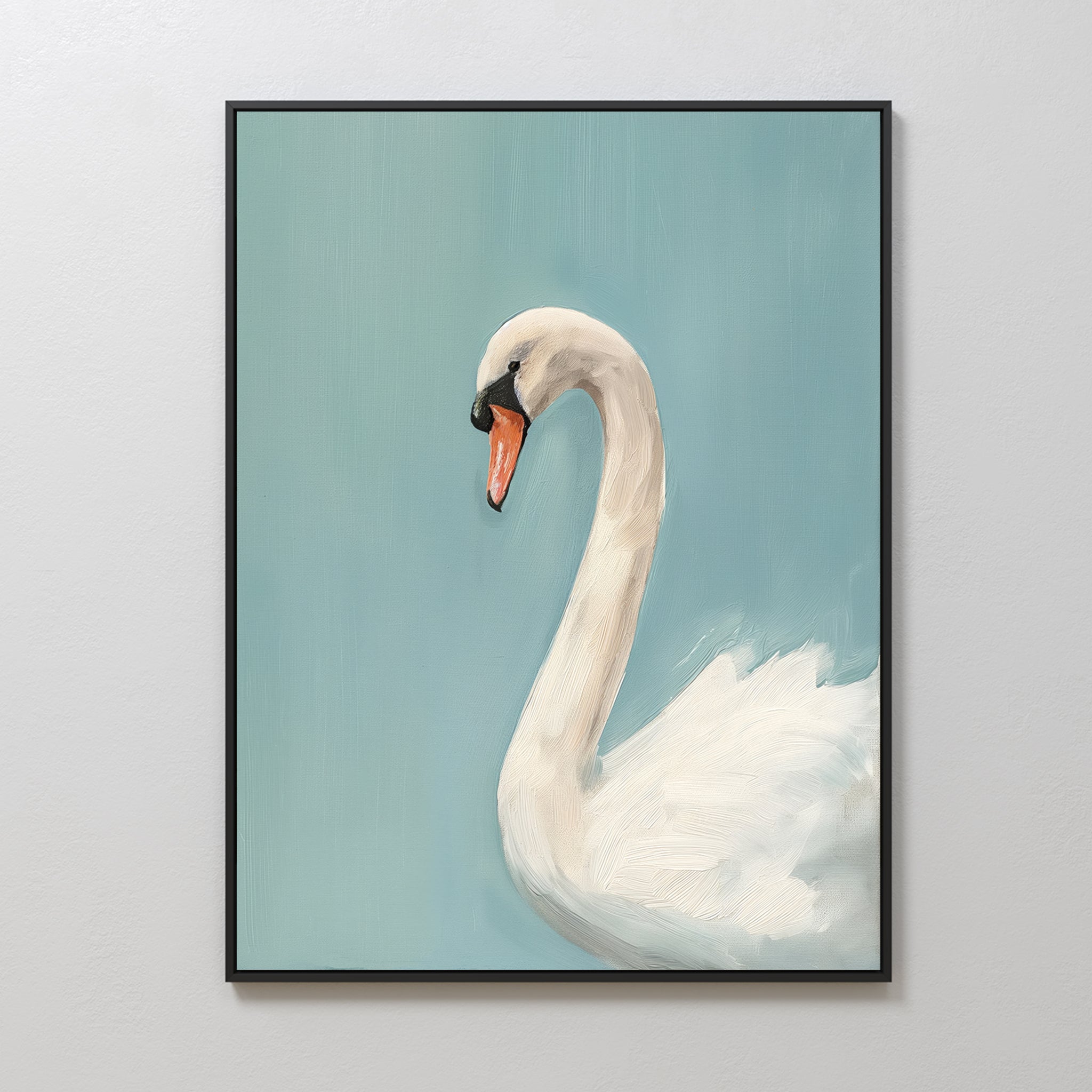 The Regal Swan Canvas Art is a framed minimalist wall piece showing a white swan with an orange beak, elegantly set against a soft blue background and displayed on a light-colored wall.