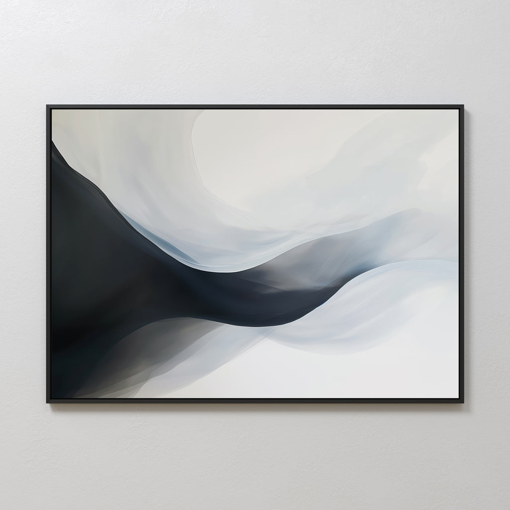 The Rippling Vista Abstract Canvas Art features flowing curves in black, gray, and white for a modern, elegant look. Framed in black, this minimalist wall art adds serene style when displayed on a light-colored wall.