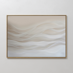 The Sandy Hues Abstract Canvas Art features soft, wave-like shapes in beige, white, and light gray, framed for a minimalist look—perfect wall art to enhance your living room decor.