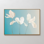 Stellar Flora Abstract Canvas Art features three delicate white flowers with long stems on a blue-to-pale gradient, adding a soft, modern, minimalist touch—perfect for elevating your living room decor.