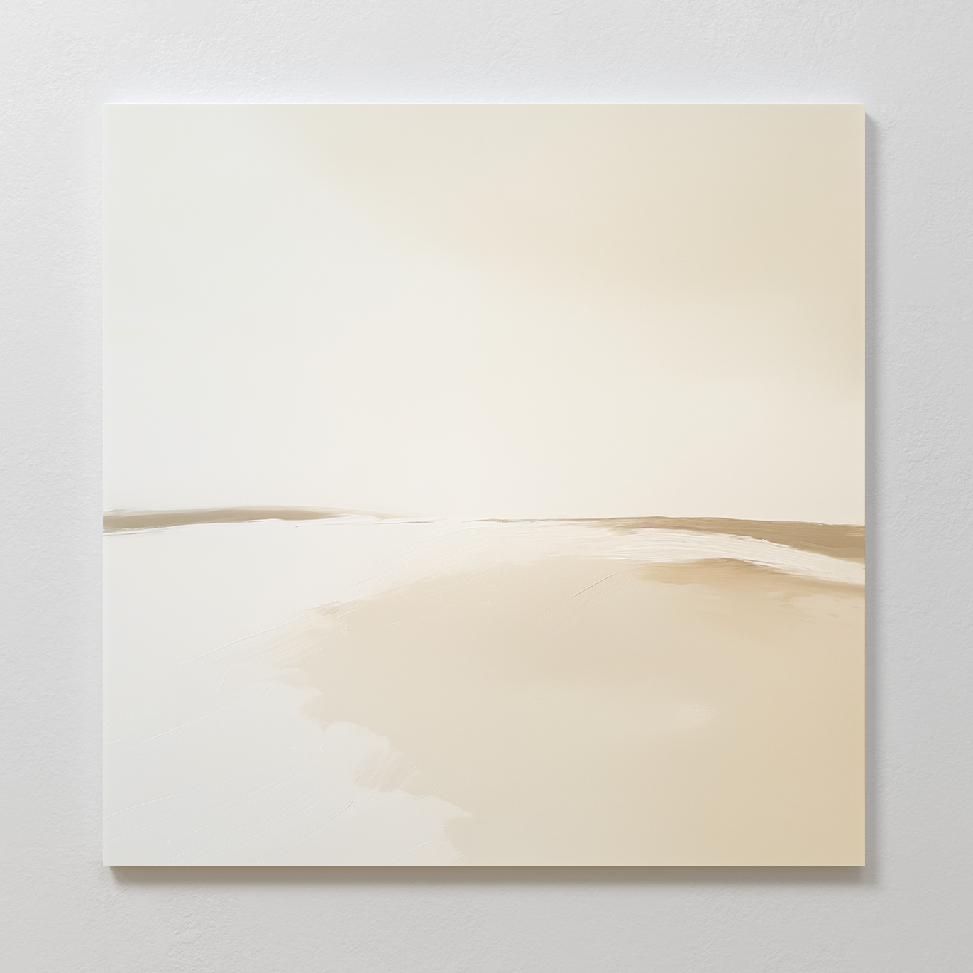 The Serene Expanse Abstract Canvas Art showcases a sandy, light beige landscape with soft lines, evoking a tranquil desert or beach under a pale sky. Perfect for living room decor, its displayed on a plain white wall for a minimalist look.