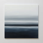 Oceanic Blur Abstract Canvas Art features horizontal bands of white, gray, and dark blue, creating a soft minimalist seascape—ideal coastal-inspired wall art for living room decor when mounted on a plain white wall.